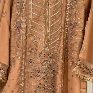 Pakistani branded dress brand is been hameed rana art